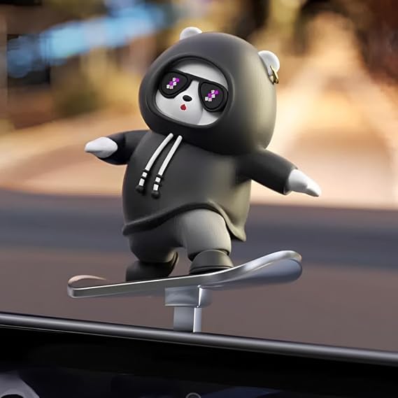 Car visor clip with a panda character on a car dashboard