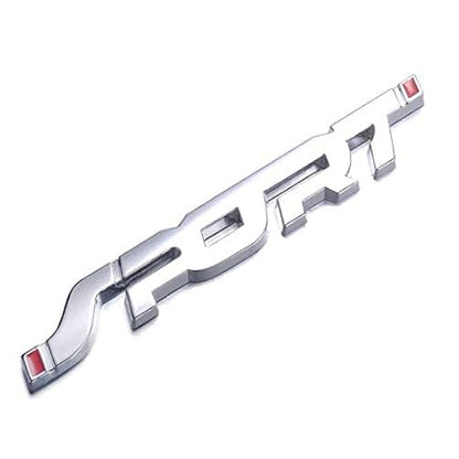 Chrome car emblem with 'R' design on a white background