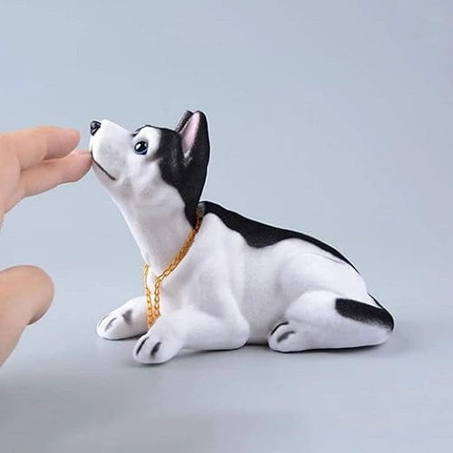 bobblehead dog doll placed on car dashboard showing nodding spring mechanism | Carokit India