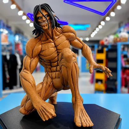 Full body view of the Attack Titan Eren Yeager action figure in a dynamic crouching pose, displayed on a solid black base as a premium anime collectible.