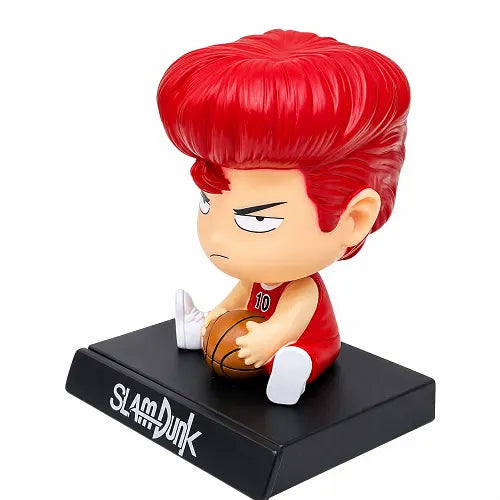Angled view of the Hanamichi Sakuragi basketball anime auto interior showpiece, highlighting his iconic red pompadour hair, red number 10 jersey, and determined facial expression.