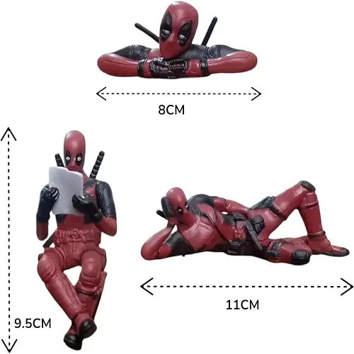 Size and dimensions chart for the Deadpool dashboard ornaments, detailing that the leaning figure is 8 centimeters wide, the sitting figure is 9.5 centimeters tall, and the lying down figure is 11 centimeters wide.