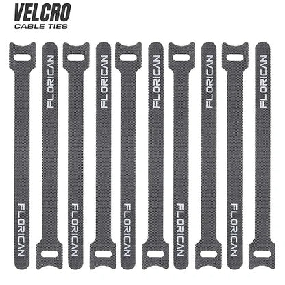 Ten black Florican branded velcro cable ties laid out vertically side-by-side, showcasing the multipack design ideal for comprehensive electronic wire organization.