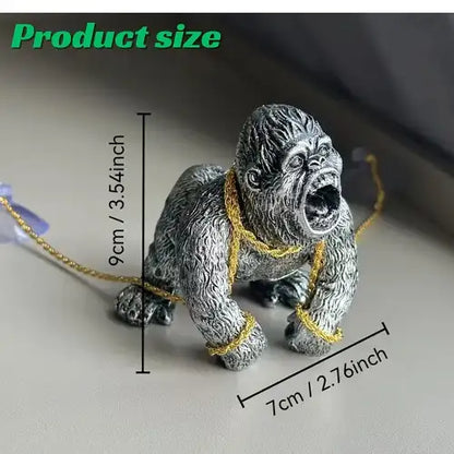Product size and dimensions of the silver gorilla dashboard figure, indicating it measures 9 centimeters (3.54 inches) tall and 7 centimeters (2.76 inches) wide.