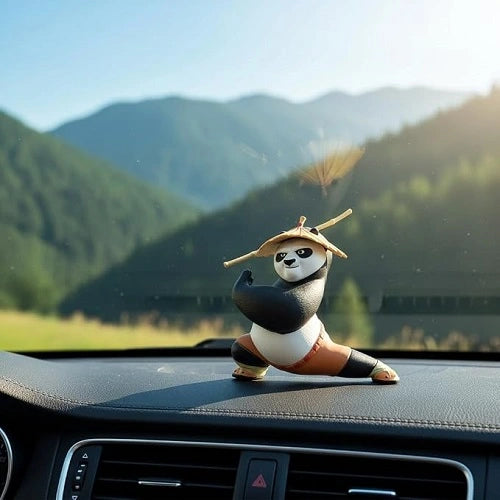 The Kung Fu Panda car dashboard accessory mounted securely on a vehicle's dashboard, featuring the martial arts character in a dynamic pose against a scenic mountain road background.