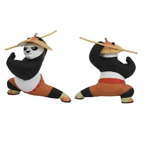 Front and back views of the Kung Fu Panda dashboard figure, showing the detailed 360-degree sculpting of the character's wide martial arts stance and the bamboo staff resting across its shoulders.