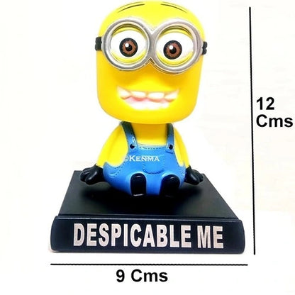 Dimensions of the Minion car dashboard accessory, illustrating a total height of 12 centimeters and a base width of 9 centimeters.