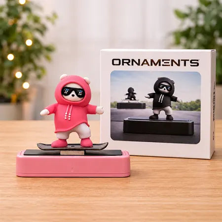 The pink sliding panda car dashboard accessory displayed next to its official retail packaging box, making it an excellent ready-to-gift car interior decoration.